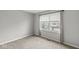 This bedroom features a window with a view of the neighborhood at 9553 Maple Way, Indianapolis, IN 46268