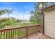 Cozy outdoor deck space offers a relaxing spot with a view of the surrounding neighborhood at 9553 Maple Way, Indianapolis, IN 46268