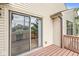This deck features a sliding glass door and a view of the backyard at 9553 Maple Way, Indianapolis, IN 46268