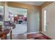 Inviting entryway featuring hardwood floors and a glimpse into the living room at 9602 Sweet Clover Way, Fishers, IN 46038