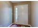 Welcoming entryway with hardwood floors and a white front door with sidelight at 9602 Sweet Clover Way, Fishers, IN 46038