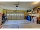 The large two-car garage provides ample space for vehicles and storage at 9602 Sweet Clover Way, Fishers, IN 46038