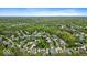 Beautiful aerial view of a tree-lined neighborhood showcasing the lush greenery at 9656 Loganberry Ln, Indianapolis, IN 46256