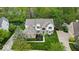 Stunning aerial view of a two-story home with a beautifully landscaped yard at 9656 Loganberry Ln, Indianapolis, IN 46256