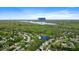 Stunning aerial view of a wooded neighborhood near Geist Reservoir at 9656 Loganberry Ln, Indianapolis, IN 46256