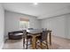 Finished basement featuring a dinning area, small window, and modern decorations at 9656 Loganberry Ln, Indianapolis, IN 46256