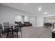 Spacious finished basement featuring hardwood floors and open layout, perfect for relaxing or entertaining at 9656 Loganberry Ln, Indianapolis, IN 46256