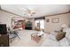 Bright living room featuring neutral walls, carpeted floors, comfortable seating, and natural light at 9660 Old Haggard Rd, Morgantown, IN 46160