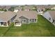 Aerial view showcasing a backyard, covered patio, and the surrounding neighborhood of single-Gathering homes at 9696 Parkhurst Xing, McCordsville, IN 46055
