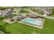 A lovely community pool, playground, and gathering area provides recreation and relaxation at 9696 Parkhurst Xing, McCordsville, IN 46055