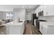 Bright kitchen with modern appliances, a center island, and ample counter space, perfect for cooking at 9696 Parkhurst Xing, McCordsville, IN 46055