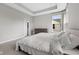 Spacious main bedroom features a tray ceiling, creating an inviting space at 9696 Parkhurst Xing, McCordsville, IN 46055
