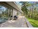 Spacious deck perfect for outdoor dining, offering a seamless transition to the tranquil backyard at 9806 Raintree N Dr, Columbus, IN 47201