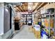Unfinished basement storage area with ample shelving for organization and storage solutions at 10746 Gateway Dr, Fishers, IN 46037