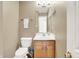 Bathroom features a toilet and sink, providing essential amenities in a compact space at 10746 Gateway Dr, Fishers, IN 46037