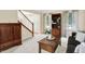 Bright living room with a staircase, hardwood floors and a nice view at 10746 Gateway Dr, Fishers, IN 46037