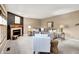 Inviting living room features a cozy fireplace, plush seating, and ample natural light at 10746 Gateway Dr, Fishers, IN 46037