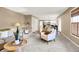 Spacious living room leading into the kitchen and dining area provides ample space for comfortable living at 10746 Gateway Dr, Fishers, IN 46037
