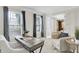Cozy home office with a large desk, an armchair and bright window light at 10746 Gateway Dr, Fishers, IN 46037