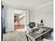 Inviting home office with a view of the stairs and hardwood floors at 10746 Gateway Dr, Fishers, IN 46037