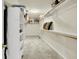 Spacious walk-in closet featuring carpet flooring, shelving and rod storage at 10746 Gateway Dr, Fishers, IN 46037