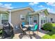 Inviting outdoor patio with dining table, chairs, and grill, perfect for enjoying outdoor meals at 10992 Chapel Woods S Blvd, Noblesville, IN 46060