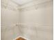 Spacious walk-in closet featuring an arrangement of white wire shelving and wood floor at 10992 Chapel Woods S Blvd, Noblesville, IN 46060