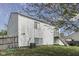 Well-maintained backyard featuring a two-story home with vinyl siding and a deck at 110 Meadow Creek Blvd, Whiteland, IN 46184