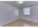 Bedroom with laminate flooring and a window allowing for plenty of natural light at 110 Meadow Creek Blvd, Whiteland, IN 46184
