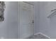 An interior front door showing a white door and gray flooring at 110 Meadow Creek Blvd, Whiteland, IN 46184