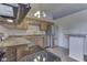 The kitchen features stainless steel appliances, wood cabinetry and updated counter tops at 110 Meadow Creek Blvd, Whiteland, IN 46184