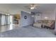 Open floor plan with the living room looking into the kitchen and dining areas at 110 Meadow Creek Blvd, Whiteland, IN 46184