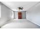 Bedroom with two windows and a large wardrobe at 11424 Geist Valley Dr, Indianapolis, IN 46236