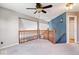 Upper hallway featuring wooden railing at 11424 Geist Valley Dr, Indianapolis, IN 46236