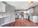 Modern kitchen featuring white cabinets, stainless steel appliances, and granite countertops at 11424 Geist Valley Dr, Indianapolis, IN 46236