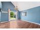 Inviting living room with wood floors, backyard access, and ample natural light at 11424 Geist Valley Dr, Indianapolis, IN 46236