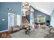 Spacious living room featuring high ceilings, hardwood floors, and modern decor at 11424 Geist Valley Dr, Indianapolis, IN 46236
