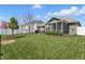 Grassy backyard, perfect for outdoor activities and relaxation, featuring a fenced perimeter at 1275 Cliff View Dr, Westfield, IN 46074