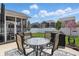 Spacious backyard with patio, screened-in porch, and dining area, ideal for outdoor living at 1275 Cliff View Dr, Westfield, IN 46074