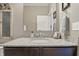 Stylish bathroom vanity featuring a granite countertop, undermount sink, and decorative mirror at 1275 Cliff View Dr, Westfield, IN 46074