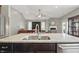 Modern kitchen with an island and open concept design with seamless flow to the living space at 1275 Cliff View Dr, Westfield, IN 46074