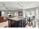 Spacious open-concept kitchen with island, seamlessly connected to living and dining areas at 1275 Cliff View Dr, Westfield, IN 46074