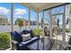 Relaxing screened-in patio with comfortable seating and outdoor view, great for entertaining at 1275 Cliff View Dr, Westfield, IN 46074