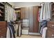 Well-organized walk-in closet with ample storage, shelves, and hanging space at 1275 Cliff View Dr, Westfield, IN 46074
