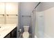 Clean bathroom with a tub, shower, toilet, vanity, and neutral-colored walls at 13323 Susser Way, Fishers, IN 46037