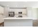 Kitchen featuring a large island with stainless steel appliances and bright white cabinetry at 13776 Tender Dr, Carmel, IN 46032