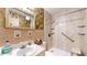 Standard bathroom featuring a walk-in shower with built-in shelving and updated fixtures at 1402 Arcola Ct, Beech Grove, IN 46107