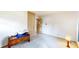 A bedroom featuring neutral walls, closet space, and a vintage wood chest at 1402 Arcola Ct, Beech Grove, IN 46107