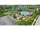 Aerial view of community amenities, including a pool, playground, tennis court, and a pond at 14162 Nicholas Dr, Carmel, IN 46074