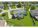 View of the home and backyard with mature trees and a pergola-covered patio at 14162 Nicholas Dr, Carmel, IN 46074